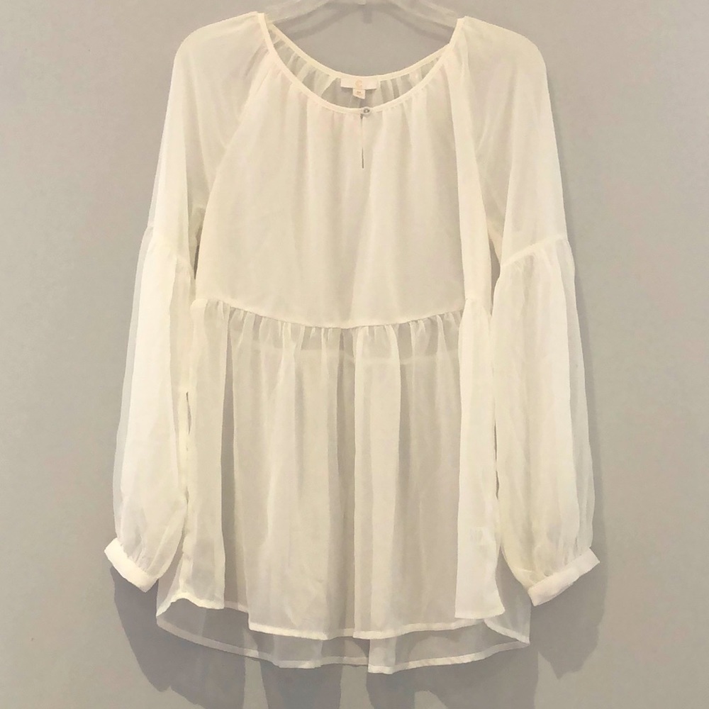 Sheer peplum tunic off-white color. Size M.